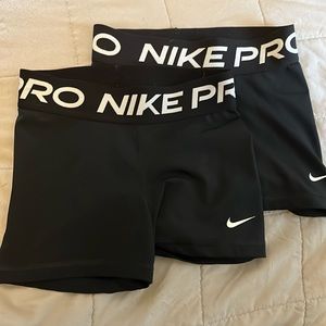 Bundle of two pairs of womens Nike Pro shorts, size XS